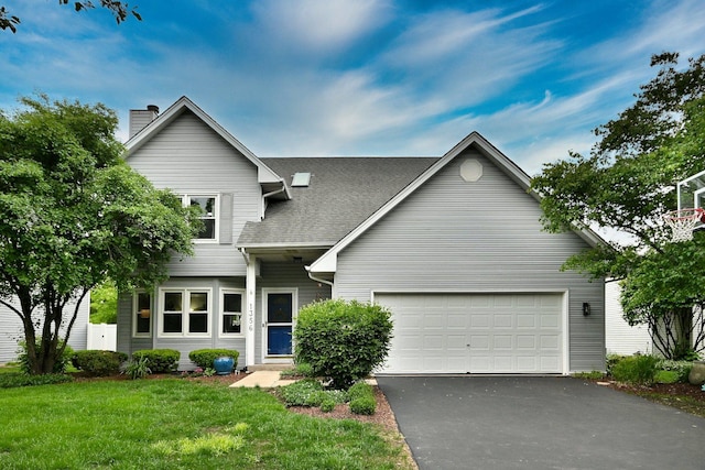 1356 Valayna Dr, Aurora, IL 60504 - traditional home with asphalt driveway, an attached garage, a chimney, a front lawn, and roof with shingles