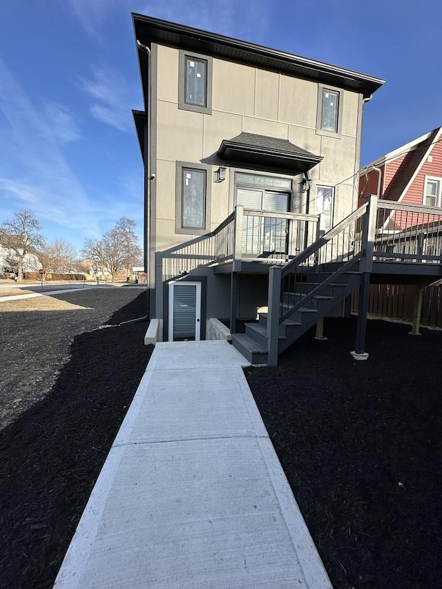 302 S 7th Ave, Maywood, IL 60153 - back of house with stairway and a wooden deck