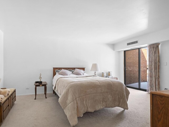 1415 E Central Rd Unit 421C, Arlington Heights, IL 60005 - bedroom with light colored carpet and access to outside