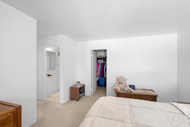 1415 E Central Rd Unit 421C, Arlington Heights, IL 60005 - bedroom with light colored carpet, a walk in closet, a closet, and ensuite bathroom