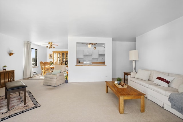 1415 E Central Rd Unit 421C, Arlington Heights, IL 60005 - carpeted living area featuring ceiling fan and baseboard heating