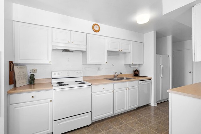1415 E Central Rd Unit 421C, Arlington Heights, IL 60005 - kitchen featuring white appliances, a sink, under cabinet range hood, and white cabinetry