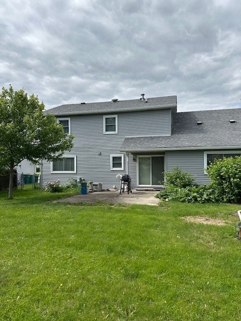 3806 Juniper Ave, Joliet, IL 60431 - rear view of house featuring a patio area and a yard
