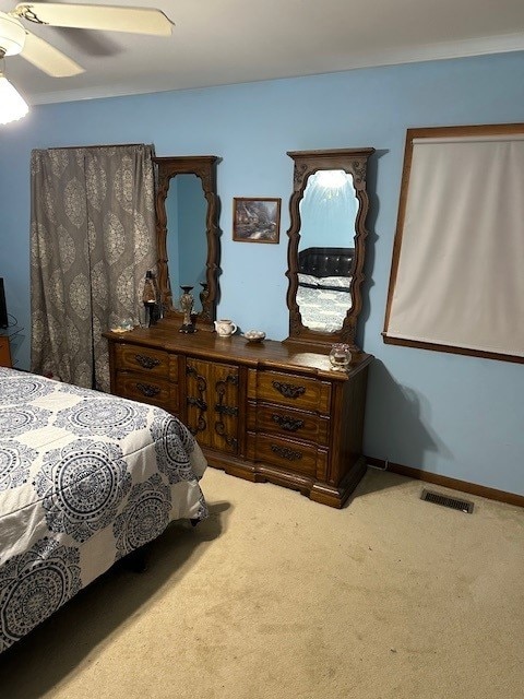 3806 Juniper Ave, Joliet, IL 60431 - bedroom featuring carpet floors, a ceiling fan, and baseboards