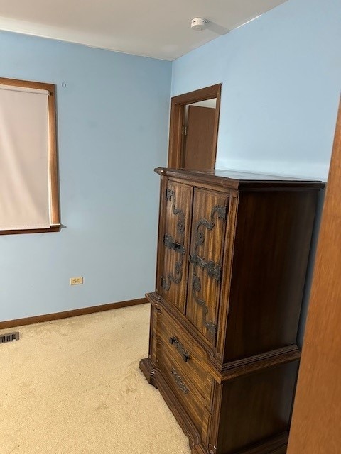 3806 Juniper Ave, Joliet, IL 60431 - detailed view of carpet flooring, baseboards, and a smoke detector