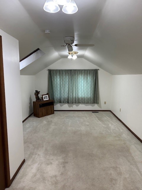3806 Juniper Ave, Joliet, IL 60431 - bonus room featuring ceiling fan, carpet flooring, baseboards, and lofted ceiling