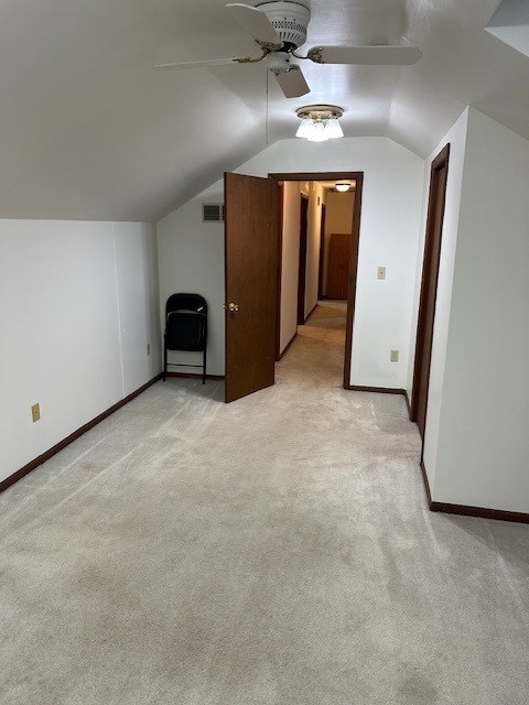 3806 Juniper Ave, Joliet, IL 60431 - additional living space featuring light colored carpet, lofted ceiling, baseboards, and ceiling fan