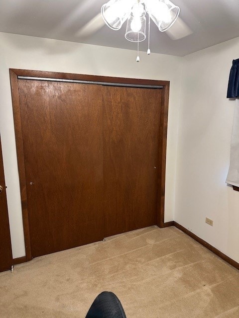 3806 Juniper Ave, Joliet, IL 60431 - unfurnished dining area with light carpet, ceiling fan, and baseboards