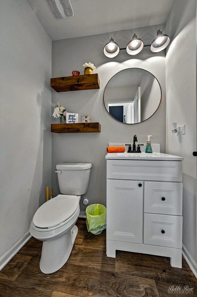 2451 Alison Ave, Pingree Grove, IL 60140 - half bath with toilet, wood finished floors, vanity, and baseboards