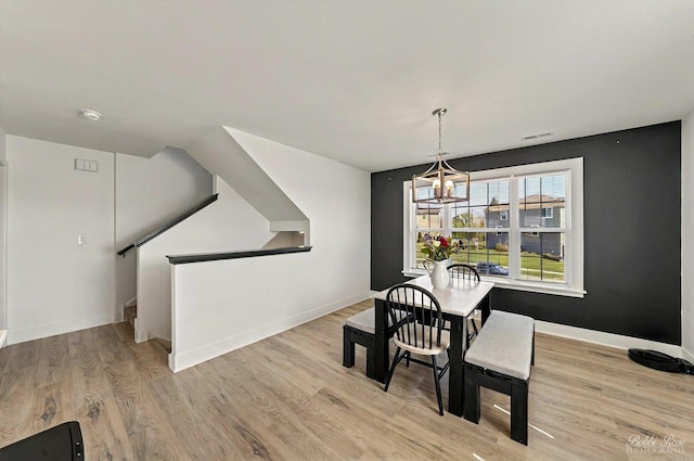 2451 Alison Ave, Pingree Grove, IL 60140 - dining room featuring wood finished floors, a chandelier, and baseboards