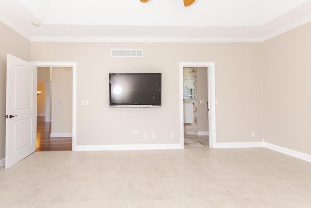 unfurnished bedroom with ornamental molding, baseboards, a ceiling fan, and light tile patterned floors