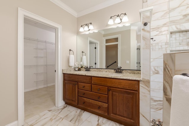 bathroom featuring marble look tile flooring, ornamental molding, double vanity, a spacious closet, and a walk in shower