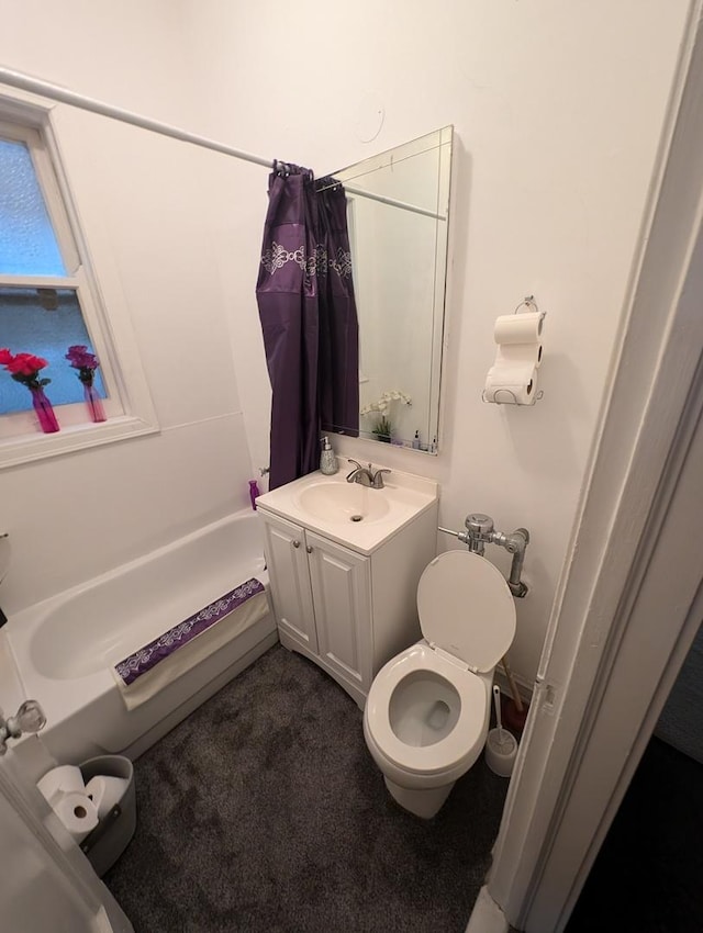 6850 S S Shore Dr Unit 2N, Chicago, IL 60649 - bathroom featuring vanity, shower / bath combo with shower curtain, and toilet