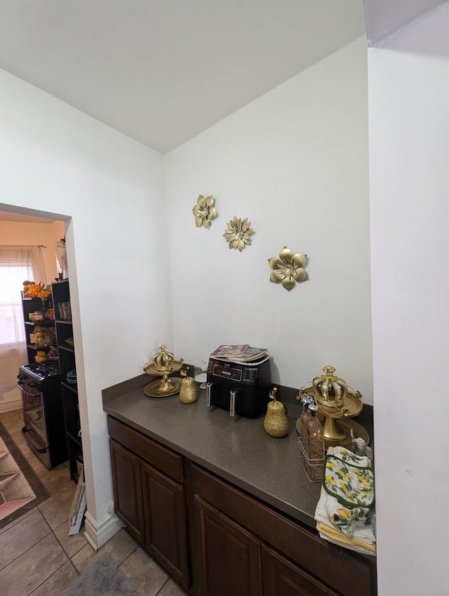 6850 S S Shore Dr Unit 2N, Chicago, IL 60649 - bar with light tile patterned flooring