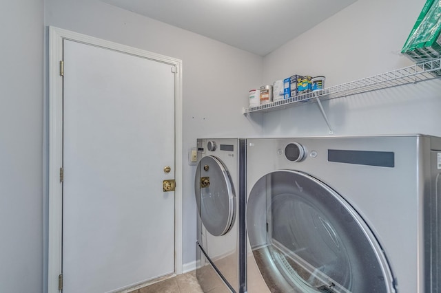 washroom with washer and clothes dryer