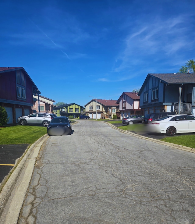 760 Mendocino Ct Unit 5, University Park, IL 60484 - view of asphalt road with a residential view and curbs