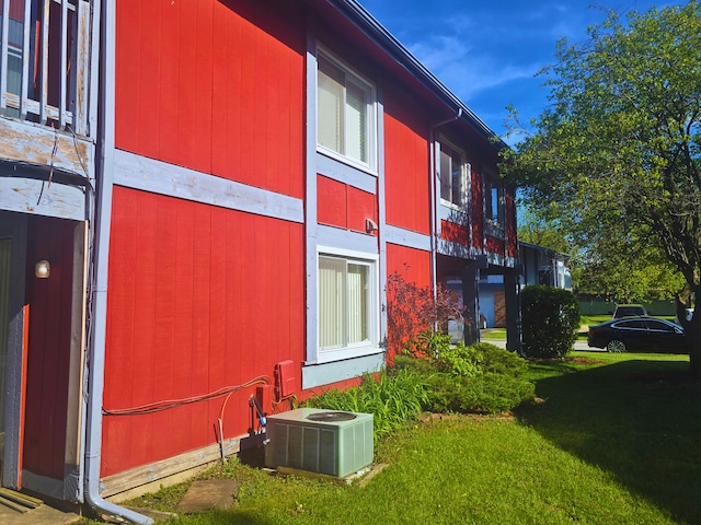 760 Mendocino Ct Unit 5, University Park, IL 60484 - view of side of home with central air condition unit and a yard