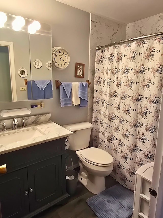 760 Mendocino Ct Unit 5, University Park, IL 60484 - bathroom with toilet, vanity, and curtained shower