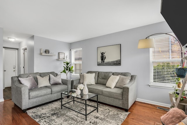 646 E Weston Ct, Round Lake Beach, IL 60073 - living room with wood finished floors and baseboards