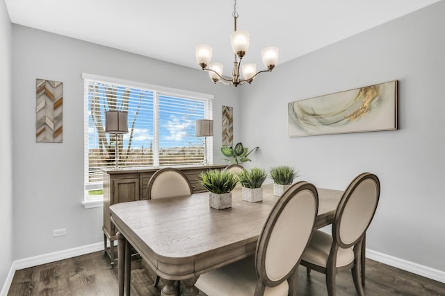 646 E Weston Ct, Round Lake Beach, IL 60073 - dining area with a chandelier, baseboards, dark wood-type flooring, and healthy amount of natural light