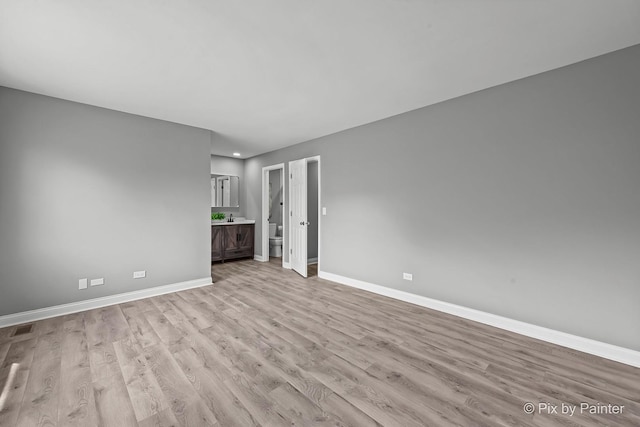 1140 Division St, Geneva, IL 60134 - spare room featuring light wood-style flooring, baseboards, and recessed lighting