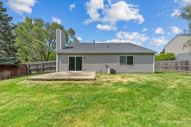 1140 Division St, Geneva, IL 60134 - rear view of house with a chimney and a wooden deck