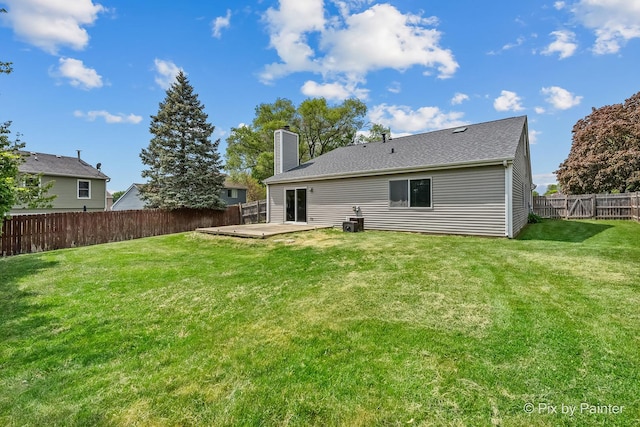 1140 Division St, Geneva, IL 60134 - back of property featuring a chimney and a patio