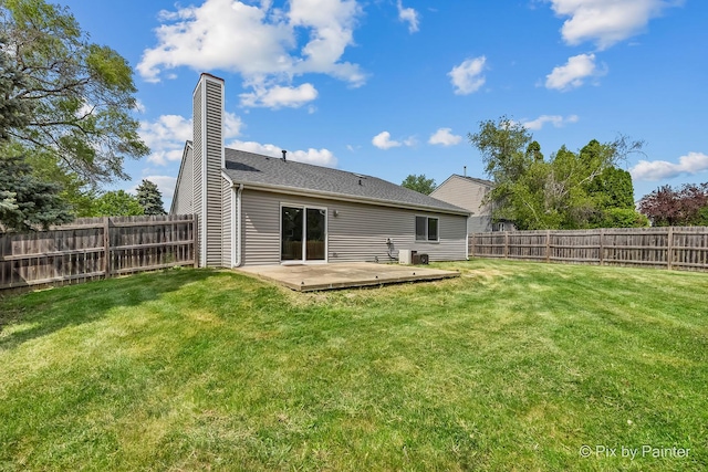 1140 Division St, Geneva, IL 60134 - rear view of property featuring a chimney