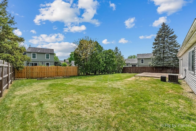 1140 Division St, Geneva, IL 60134 - view of yard featuring central AC unit and a patio area