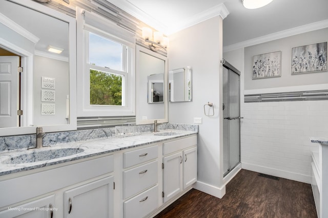 1770 Oxford Dr, Mundelein, IL 60060 - full bath with crown molding, a stall shower, wood finished floors, double vanity, and baseboards