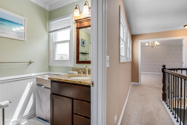 1770 Oxford Dr, Mundelein, IL 60060 - bathroom featuring a chandelier, vanity, ornamental molding, and baseboards