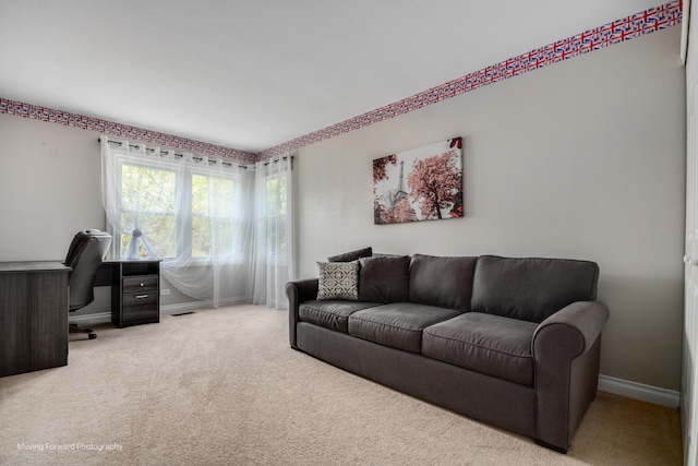 1770 Oxford Dr, Mundelein, IL 60060 - living room with baseboards, a desk, and carpet floors