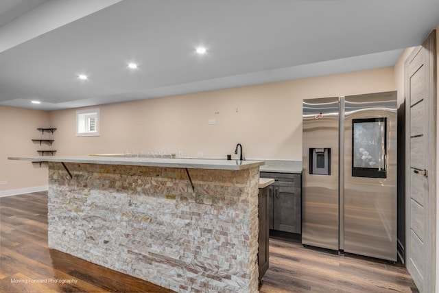 1770 Oxford Dr, Mundelein, IL 60060 - kitchen featuring stainless steel fridge with ice dispenser, dark wood finished floors, light countertops, recessed lighting, and baseboards