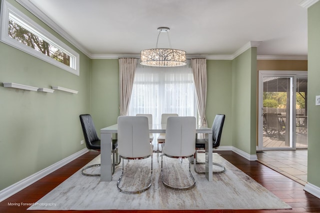 1770 Oxford Dr, Mundelein, IL 60060 - dining area with dark wood-type flooring, crown molding, baseboards, and a chandelier