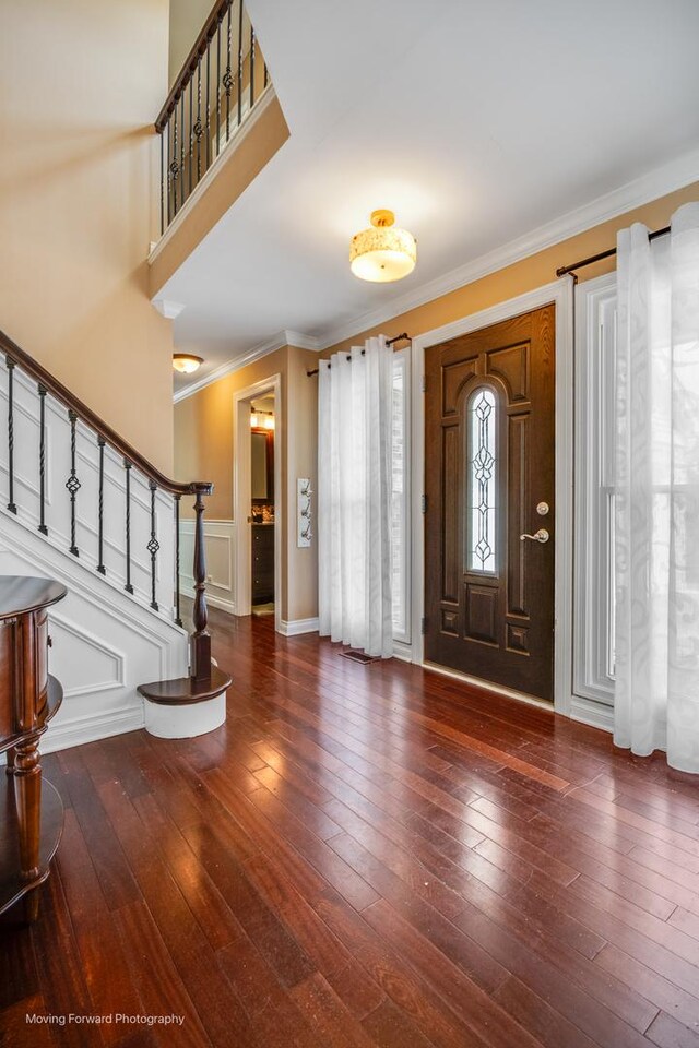 1770 Oxford Dr, Mundelein, IL 60060 - entrance foyer with crown molding, stairs, and wood-type flooring