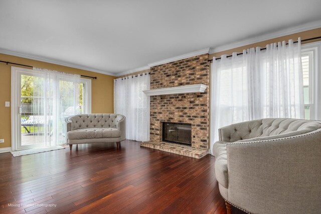 1770 Oxford Dr, Mundelein, IL 60060 - living area with hardwood / wood-style floors, crown molding, a fireplace, and baseboards