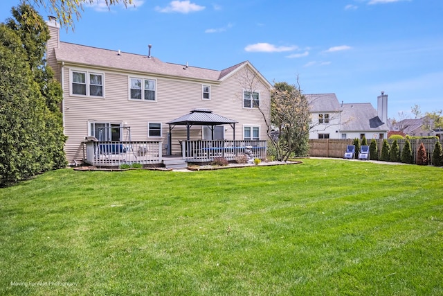 1770 Oxford Dr, Mundelein, IL 60060 - rear view of house featuring a gazebo, a wooden deck, and a chimney