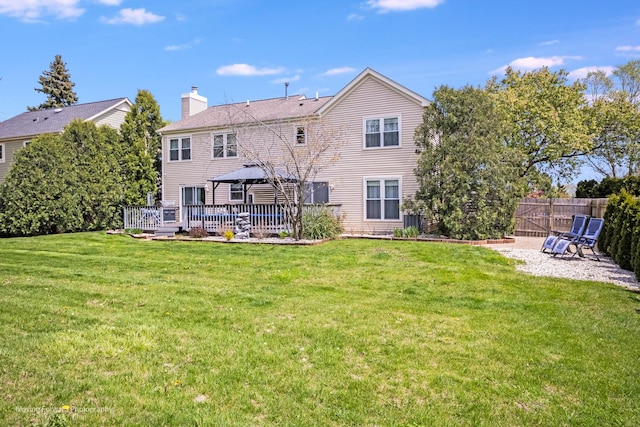 1770 Oxford Dr, Mundelein, IL 60060 - back of house featuring a gazebo, a chimney, cooling unit, a patio area, and a deck