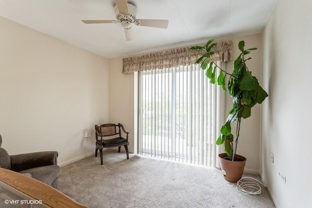 2900 Maple Ave Unit 13D, Downers Grove, IL 60515 - living area with carpet flooring, a ceiling fan, and baseboards