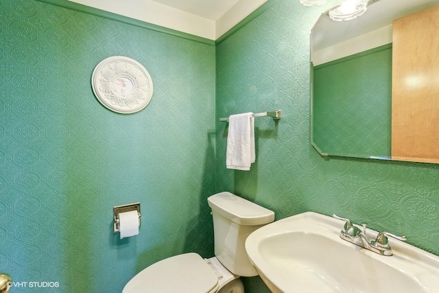 2900 Maple Ave Unit 13D, Downers Grove, IL 60515 - half bathroom with a sink and toilet