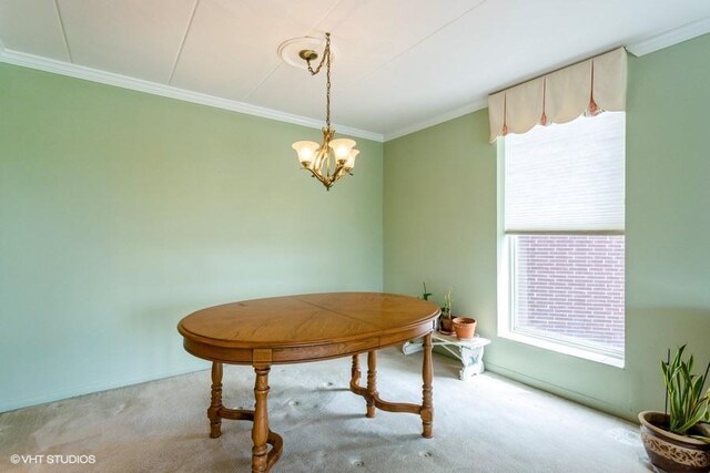 2900 Maple Ave Unit 13D, Downers Grove, IL 60515 - carpeted dining room with crown molding, a chandelier, and baseboards