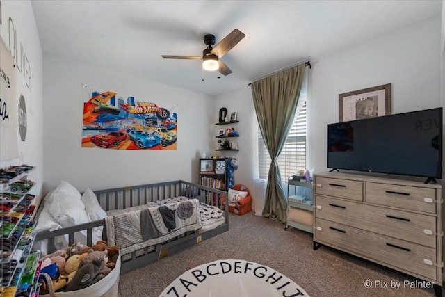 carpeted bedroom with ceiling fan