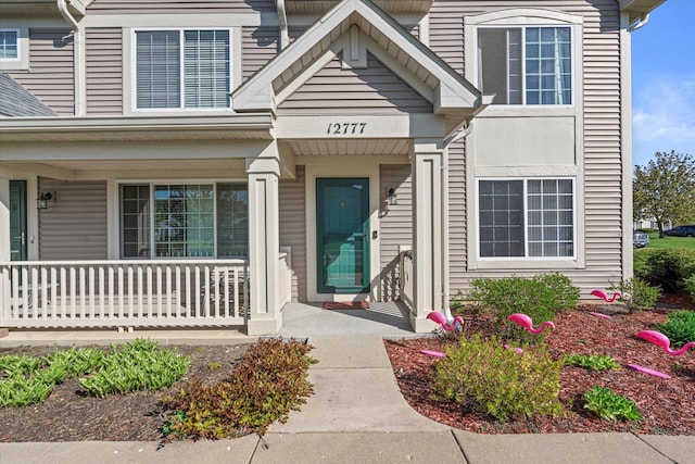 12777 W Wakefield Dr, Beach Park, IL 60083 - property entrance with a porch