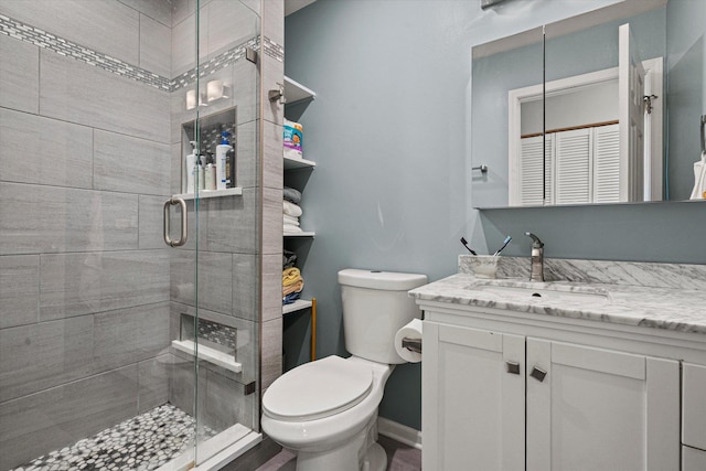 12777 W Wakefield Dr, Beach Park, IL 60083 - bathroom with a shower stall, toilet, vanity, and baseboards