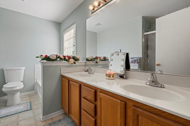 12777 W Wakefield Dr, Beach Park, IL 60083 - full bathroom featuring a shower with door, double vanity, toilet, a bathtub, and baseboards