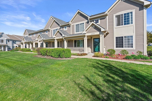 12777 W Wakefield Dr, Beach Park, IL 60083 - multi unit property featuring a front yard and a porch