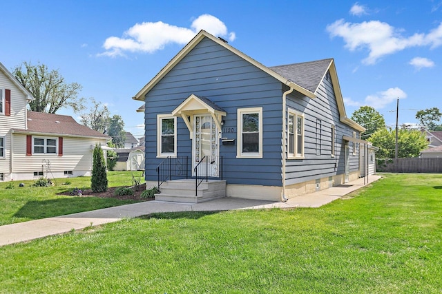 view of front of house with a shingled roof
