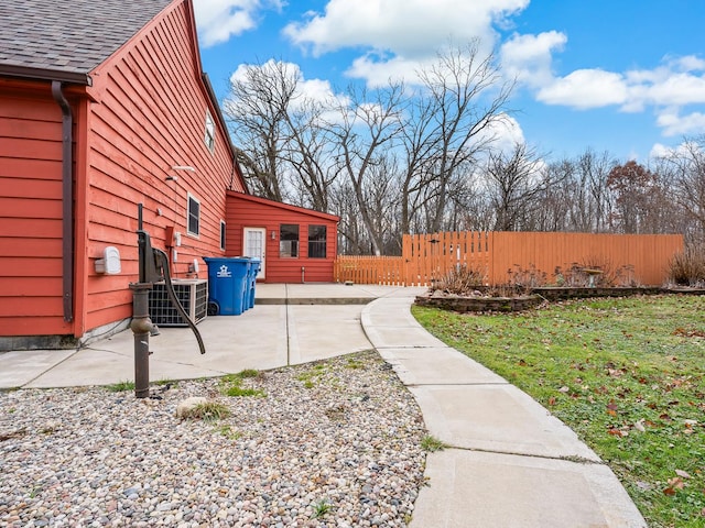 view of yard with fence and a patio area