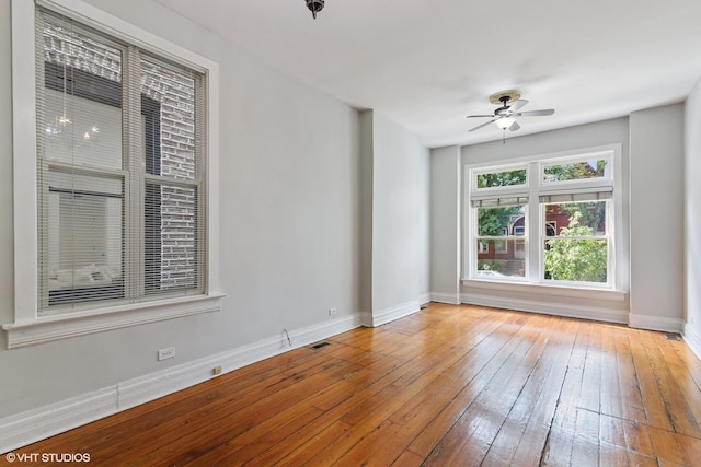 2232 W Homer St, Chicago, IL 60647 - unfurnished room featuring hardwood / wood-style floors, baseboards, and ceiling fan