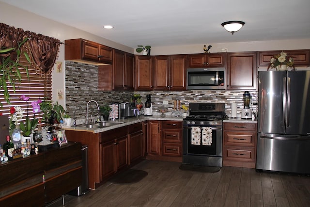 228 Janes Ave, Bolingbrook, IL 60440 - kitchen with stainless steel appliances, a sink, light countertops, dark wood-type flooring, and recessed lighting
